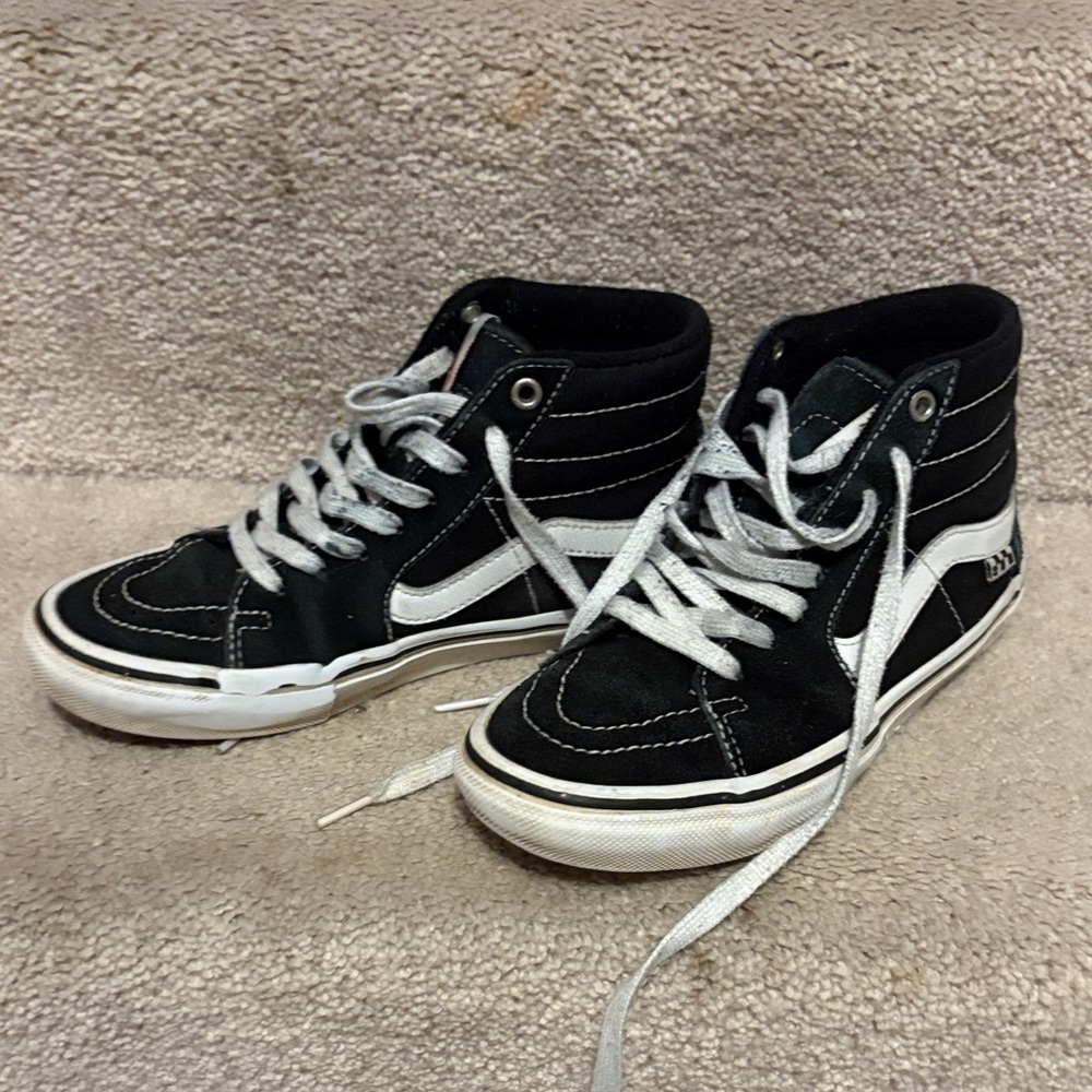 Vans Black and White High-Top Sneakers